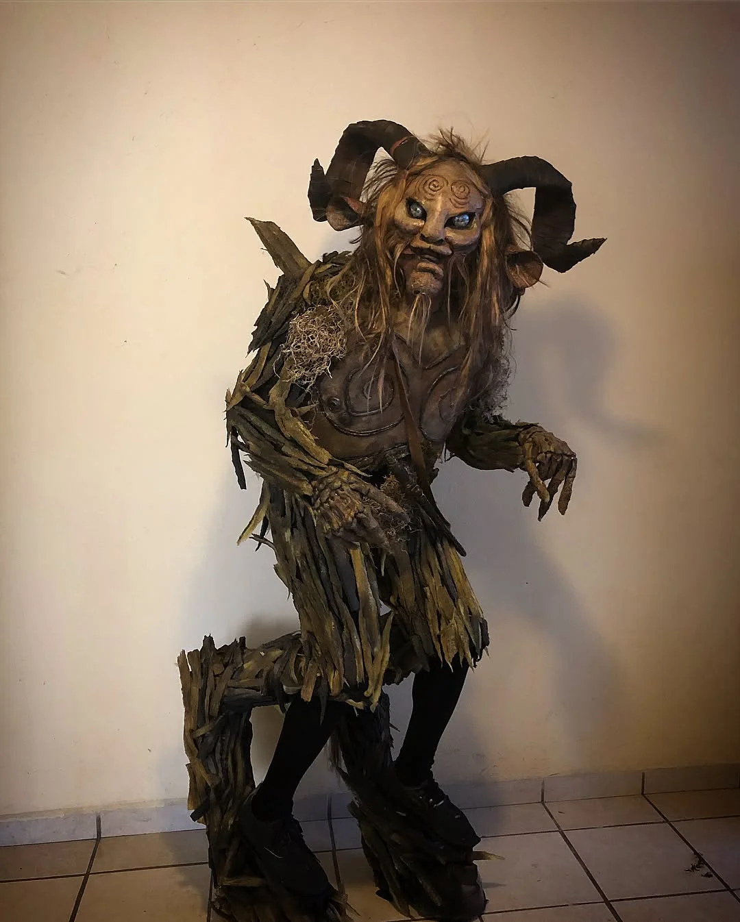 Woodland Faun Creature with Curved Horns and Bark Armor