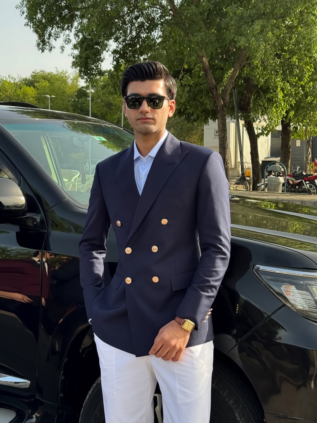 Navy Double-Breasted Blazer with Light Blue Shirt and White Trousers